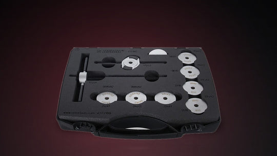 Unior 1721BB bottom bracket bearing press kit open in its case, with drifts laser-etched for BB30, BB86/92, and SRAM DUB, against a dark studio background with a red glow