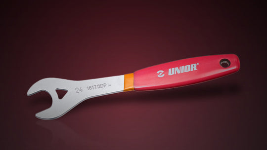A Unior 1617/2DP cone wrench on a charcoal studio background