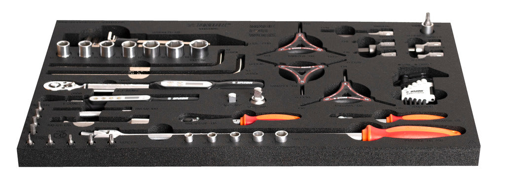 Unior 1600SOS23 bike tool tray, angled view — sockets, ratchets, Y-wrenches and both 266B electronic torque wrenches (1-20 Nm and 4.3-85 Nm) in the foam inserts