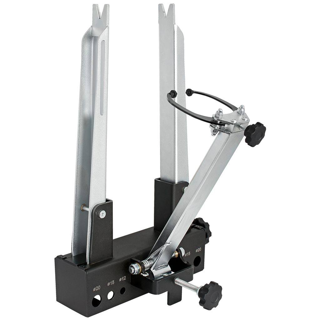 Unior bicycle wheel truing stand with adjustable silver arms and black base, numbered gauge markings for hub width