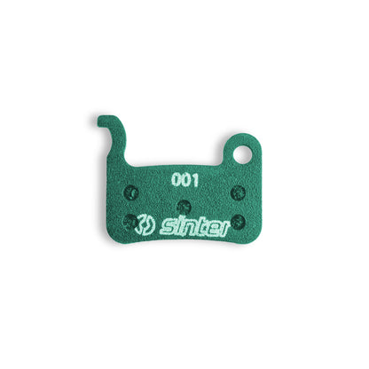 Sinter 001 Green disc brake pad backplate close-up, organic compound for Shimano A/M-type hydraulic calipers