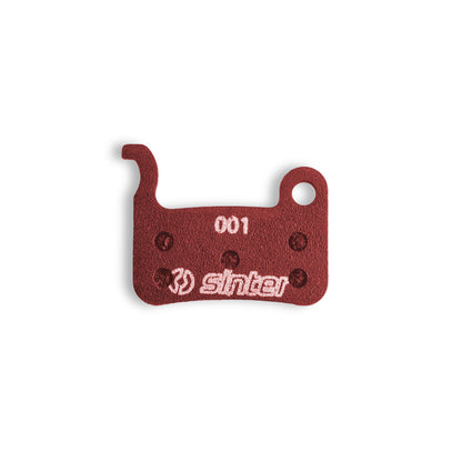 Sinter 001 Red disc brake pad backplate close-up, organic compound for Shimano A/M-type hydraulic calipers
