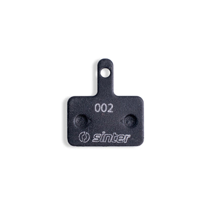 Sinter Black s550 Model 002 disc brake pad backplate stamped 002 with Sinter logo, Shimano B Type fitment