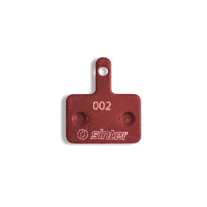 Sinter Red s514 Model 002 disc brake pad backplate stamped 002 with Sinter logo, Shimano B Type fitment