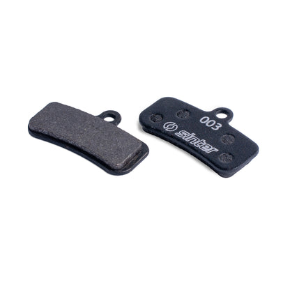 Sinter Black 003 disc brake pad pair showing organic friction surface and 003 stamped back plate for Shimano Saint Zee