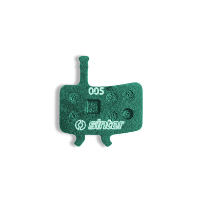 Sinter Model 005 Avid green brake pad, backplate-up view stamped with model code 005 and the sinter wordmark
