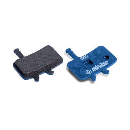 Sinter Model 005 Avid blue organic brake pad pair, friction surface alongside blue backplate stamped 005 for Avid disc brake calipers