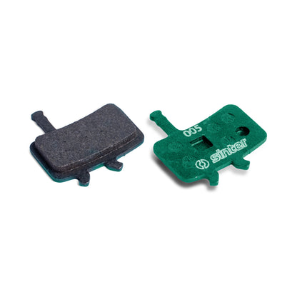 Sinter Model 005 Avid green organic brake pad pair, friction surface alongside green backplate stamped 005 for Avid disc brake calipers