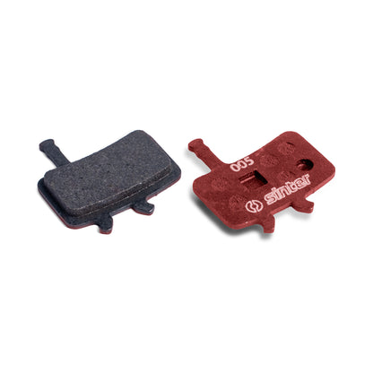 Sinter Model 005 Avid red organic brake pad pair, friction surface alongside red backplate stamped 005 for Avid disc brake calipers