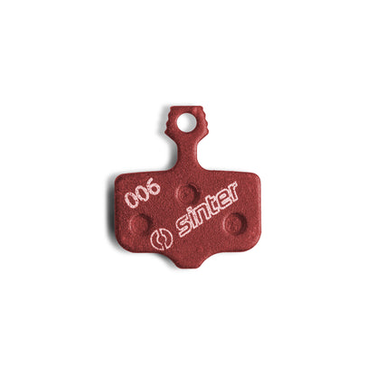 Sinter Model 006 single red organic disc brake pad with Sinter logo, Avid all-round road and trail compound