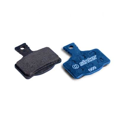 Sinter Model 009 Blue organic disc brake pad pair showing friction face and dimpled backplate for Magura calipers