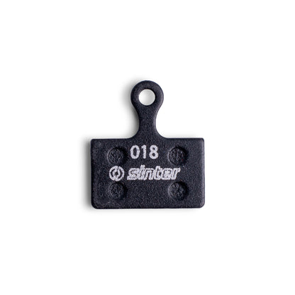 Sinter Black 018 Shimano K Type disc brake pad, organic compound front face with model 018 stamp