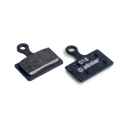 Sinter Black 018 disc brake pads for Shimano K Type, back plate and organic friction face shown