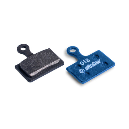 Sinter Blue 018 disc brake pads for Shimano K Type, back plate and organic friction face shown