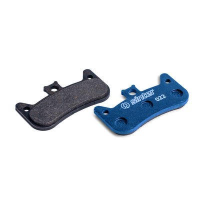 Sinter Model 022 disc brake pads, blue all-round organic compound next to worn pair for Formula Cura 4 calipers