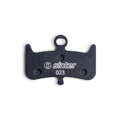 Sinter Black s023 brake pad backing plate, black compound with white sinter logo and 023 model stamp for Hayes Dominion A4