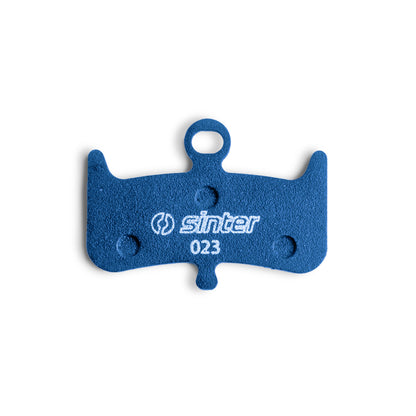 Sinter Blue s023 brake pad backing plate, blue compound with white sinter logo and 023 model stamp for Hayes Dominion A4