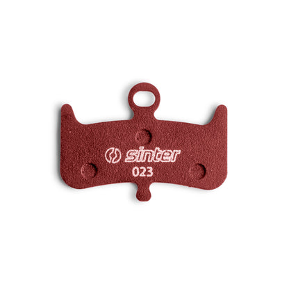Sinter Red s023 brake pad backing plate, red compound with white sinter logo and 023 model stamp for Hayes Dominion A4