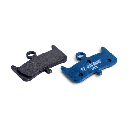 Sinter Blue s023 brake pads for Hayes Dominion A4, friction side and blue-painted backing plate with sinter 023 stamp