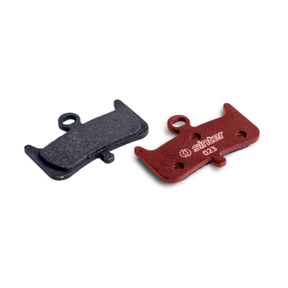 Sinter Red s023 brake pads for Hayes Dominion A4, friction side and red-painted backing plate with sinter 023 stamp