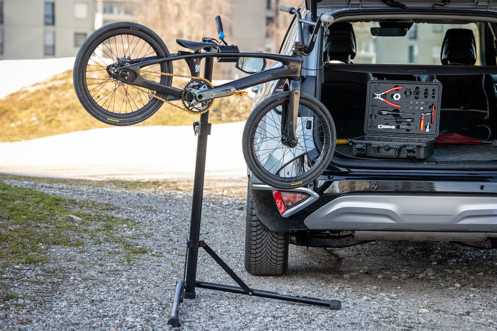 Trackside BMX service from a car tailgate with the Unior BMX Tool Kit 1600BMX open in the trunk
