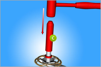Unior 1626A bearing installation tool seating a new bearing on a Campagnolo crank spindle with hammer taps