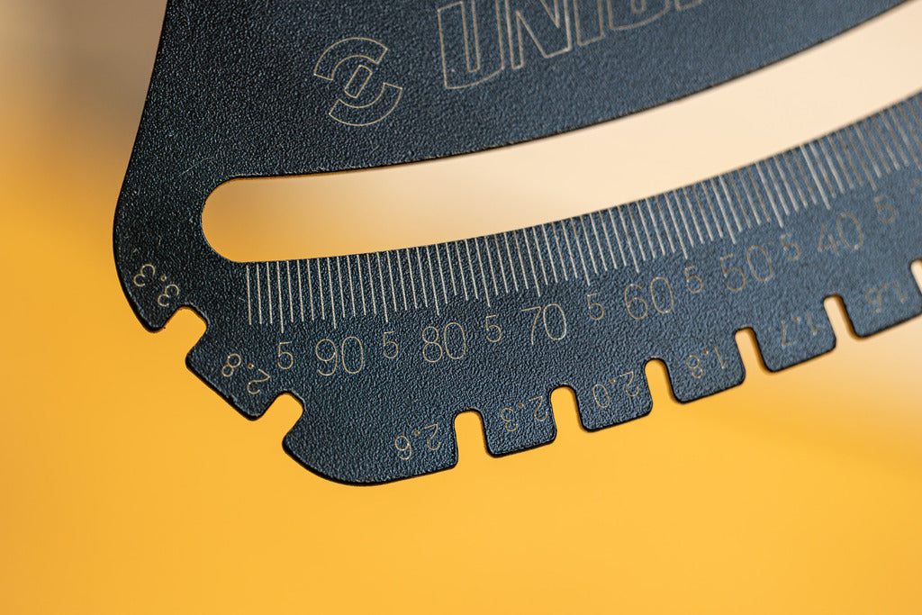Spoke Tension Meter 2.0 scale detail, numbered increments from 10 to 90 laser-etched into the steel arc