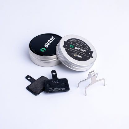 Sinter Black s550 Model 002 organic brake pad pair with tin and stainless retaining spring, Shimano B Type set