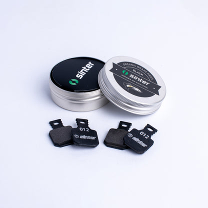 Sinter Model 012 Magura black organic brake pads with branded aluminum tin packaging labelled Organic Brake Pads Black