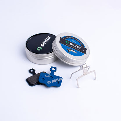 Sinter Model 006 blue organic disc brake pads with retention spring and aluminium tin, Avid fitment