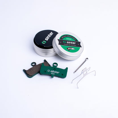 Sinter Model 023 organic disc brake pads in green race compound for Hayes Dominion A4, with tin, pin and retaining spring