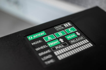 Sinter Smart Bedding Machine control panel at an angle, mode A and front wheel highlighted on the touchscreen interface