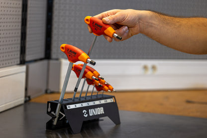 Mechanic lifting the 8 mm Unior 193HX-US T-handle hex wrench from the labeled 2 to 10 mm set holder
