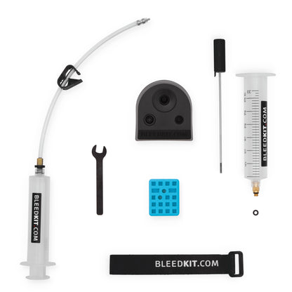 Bleedkit Premium kit for Shimano hydraulic disc brakes, syringes, funnel, blue pad spacer, wrench, and brass adapter