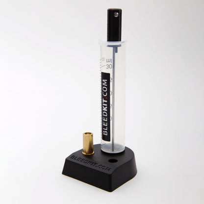 Bleedkit overflow reservoir cylinder on Bleedkit base with brass thread adapter for Shimano caliper bleed