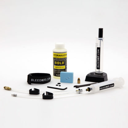 Bleedkit Premium Gold TRP/Tektro bleed kit overview, mineral oil bottle, syringe, catch cup, fittings and strap