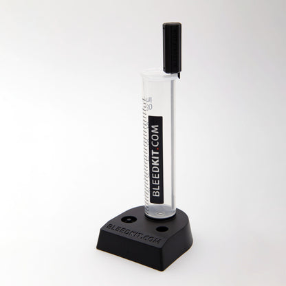Bleedkit graduated catch cup on weighted base, 30 ml clear cylinder for draining used hydraulic brake fluid