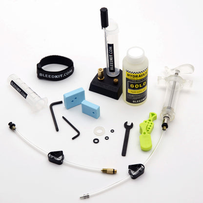 Bleedkit Master kit overview with two syringes, Gold mineral oil, syringe stand, caliper blocks, adapters, and Allen keys