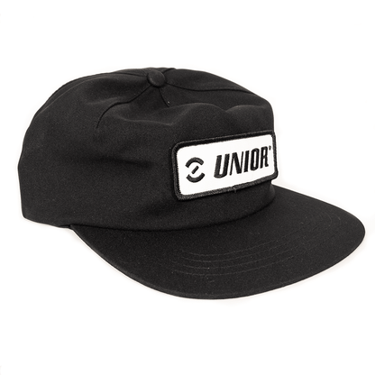 Unior Single Panel Strap Back Hat in black with white Unior logo patch on the crown and flat black brim